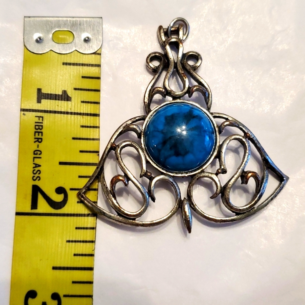 Turquoise and silver slide for a necklace
